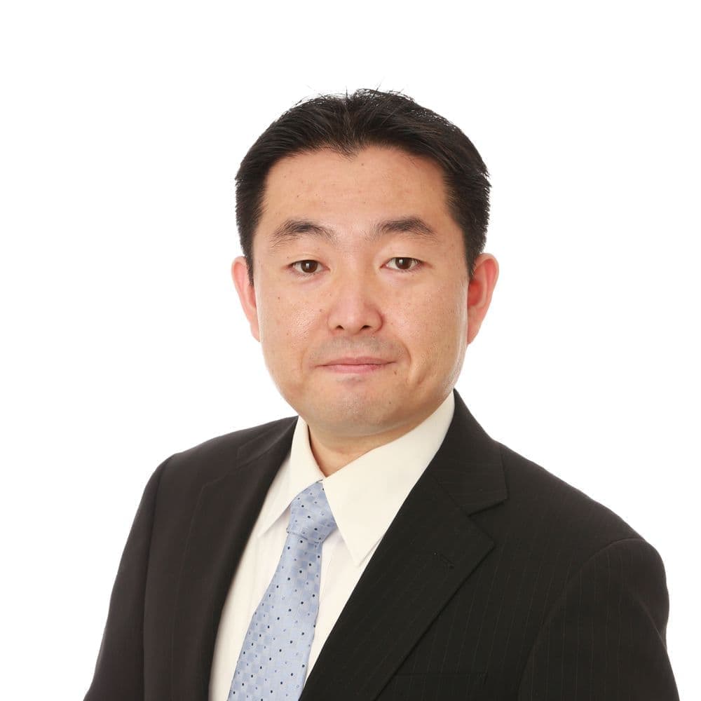 スーツ姿の代表者
